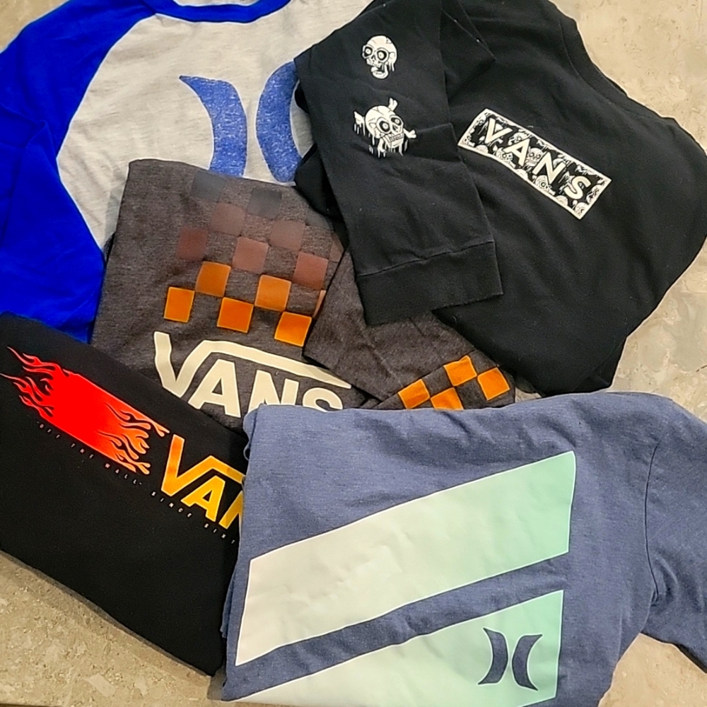 Five boys tshirts Size L one short sleeve four long sleeve.  (one men's small)